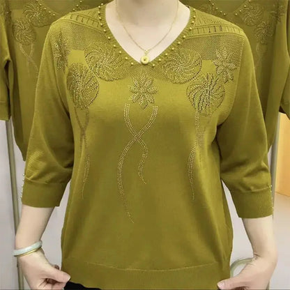 Elegantně navržený Svetr