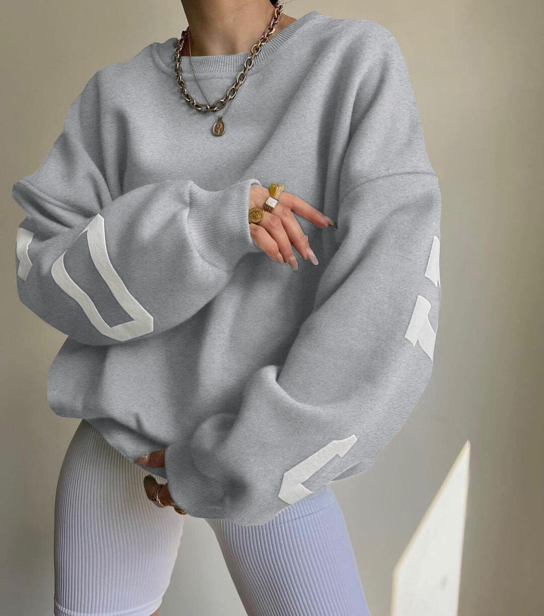 Půvabně navržený Svetr